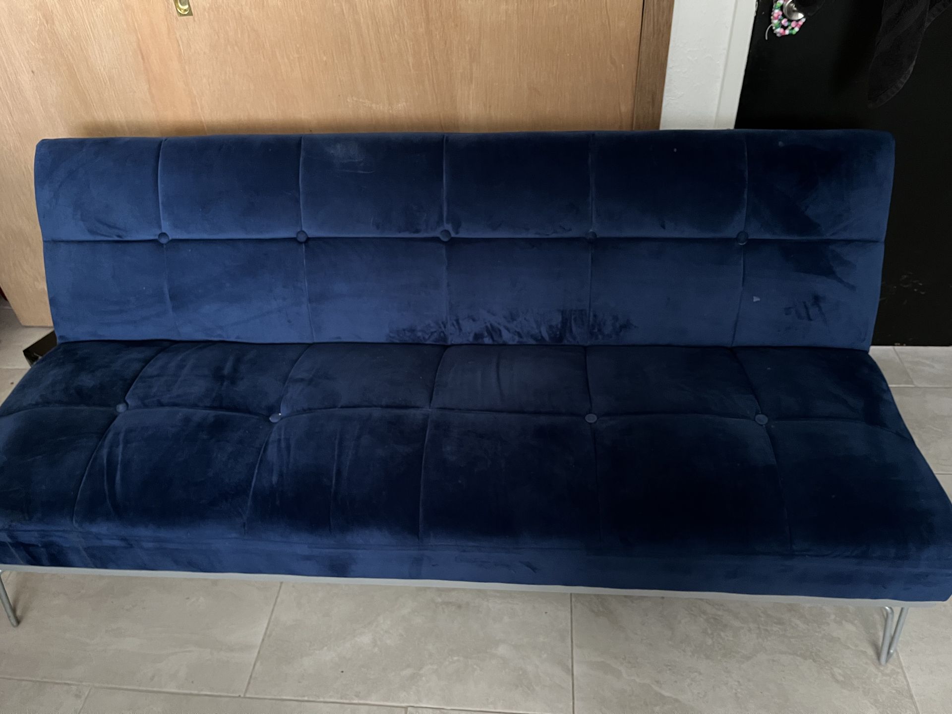 Blue futon couch