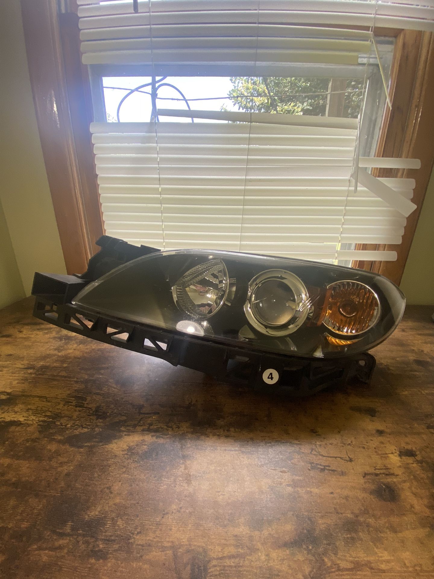 2007 Mazda 3 left driver halogen OEM headlight