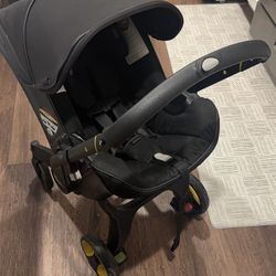 Doona Infant Car Seat and Stroller Midnight Edition | Like New