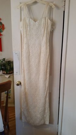 Cream pearl and lace wedding dress with train