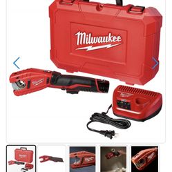 New M12 ,,12V lithium-Ion cordless copper tubing cutter with battery and charger still in box never used it for sale .
