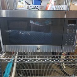 GE - 1.6 Cu Ft. Countertop Microware With Sensor Cooking - Stainless Steel