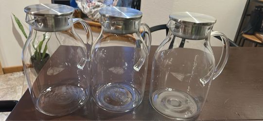 Set of 3 glass pitchers with stainless steel strainer lids –1 gallon each.