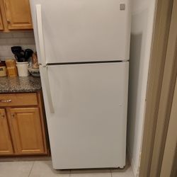 Refrigerator, Stove, Microwave And Dishwasher.