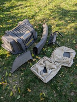 Simplicity grass and leaf bagger system. I'm keeping the riding mower itself — I just mulch everything now and haven't used this bagger in years.
It