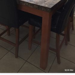 Marble Table With 6 Chairs. Table In Great Condition Chairs Some Bit Less Than Fair.