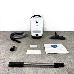 Miele C1 Olympus Canister Vacuum Cleaner w/ attachment