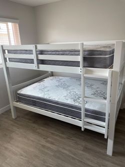 Full over full bunk bed. Available in grey, white & dark walnut. Assembly required.  Assembly not included. Tax included.  Free local delivery. 

Bunk