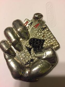 Belt buckle. Nice for display or to get the attention at your next poker game.