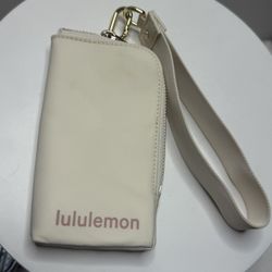 This is the Lululemon Dual Pouch Wristlet Wallet—a wristlet that combines the functionality of a wallet with space for storing small essentials.