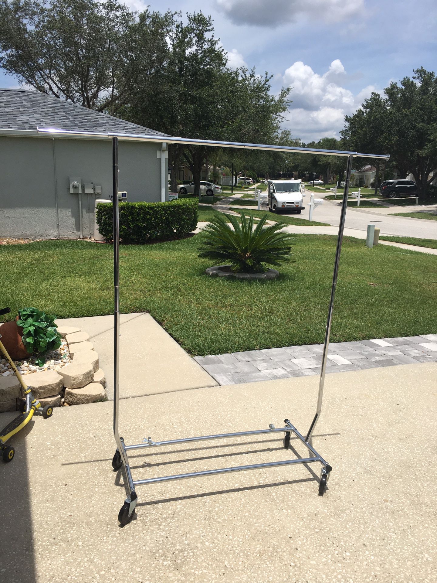 Large clothing rack with wheels