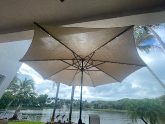 Outdoor umbrella with solar lights