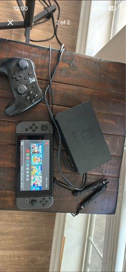 Nintendo switch (starter pack+ black piece to make joycons one controller+ Nintendo switch wired controller)