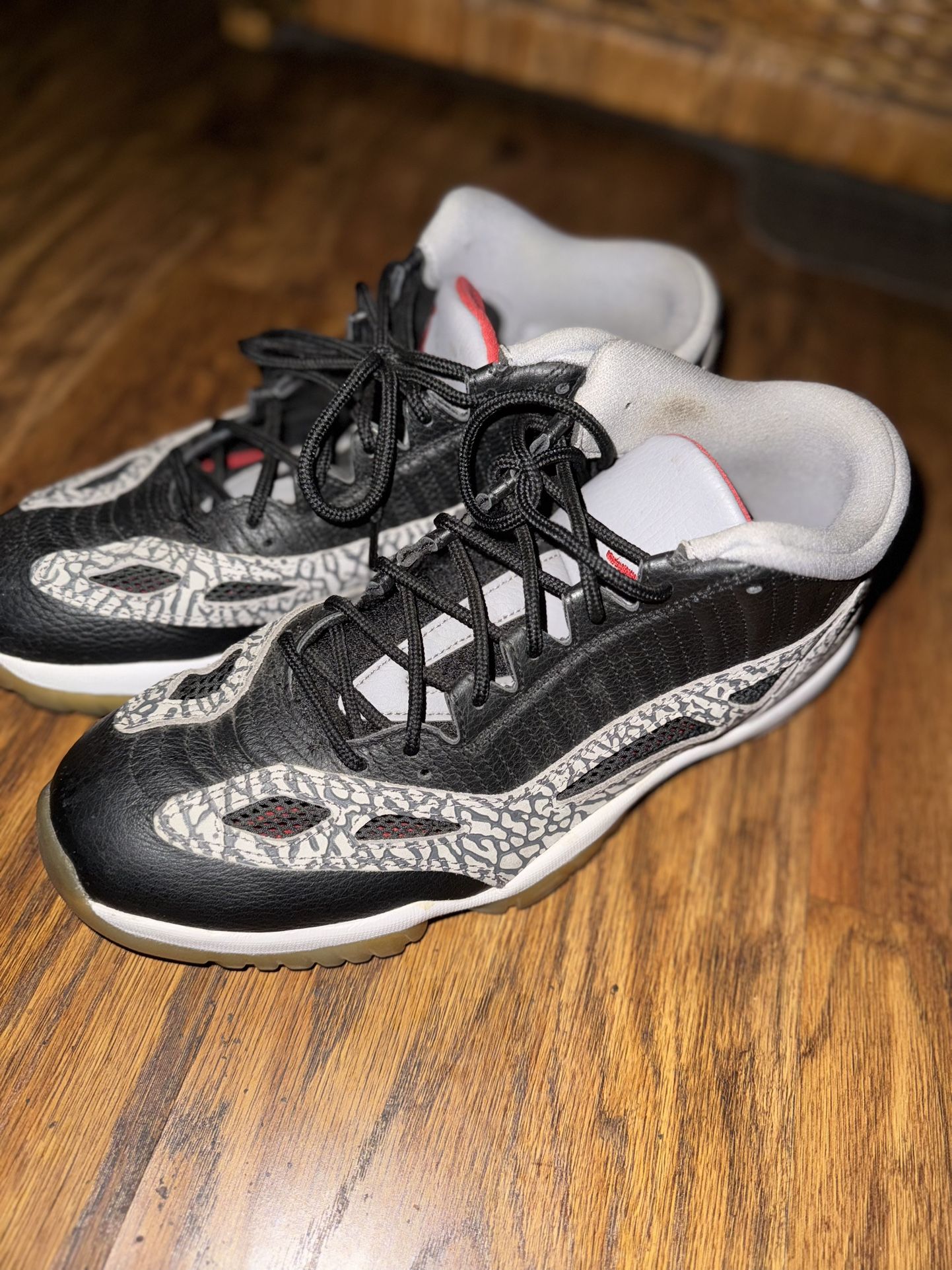Jordan 11 Low IE Black Cement