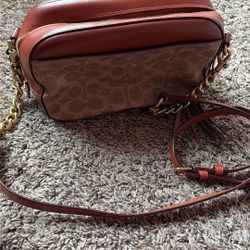 Coach Cross’s Body Bag 