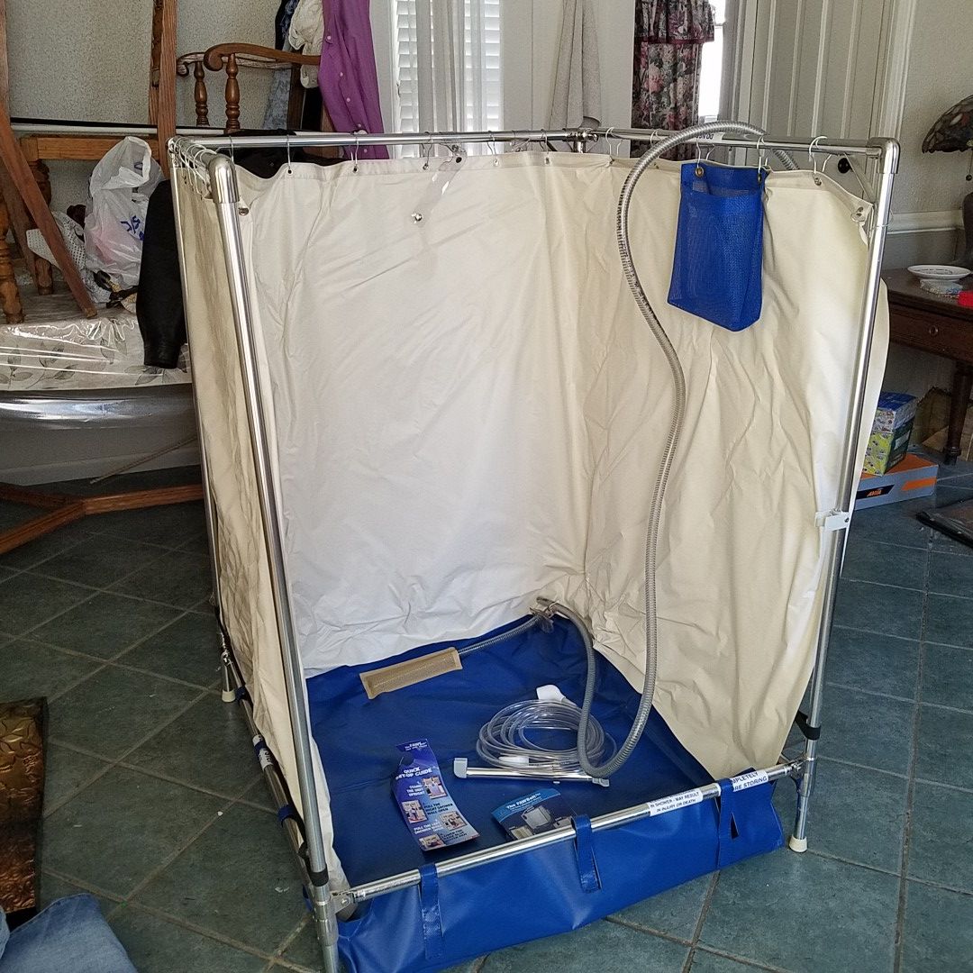 Fawsit portable shower top of the line like new. $999 firm no PVC strong lightweight metal strong pump.