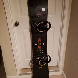 Arbor 155cm snowboard and Burton bindings