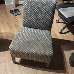 1 Grey and white pattern chair. 