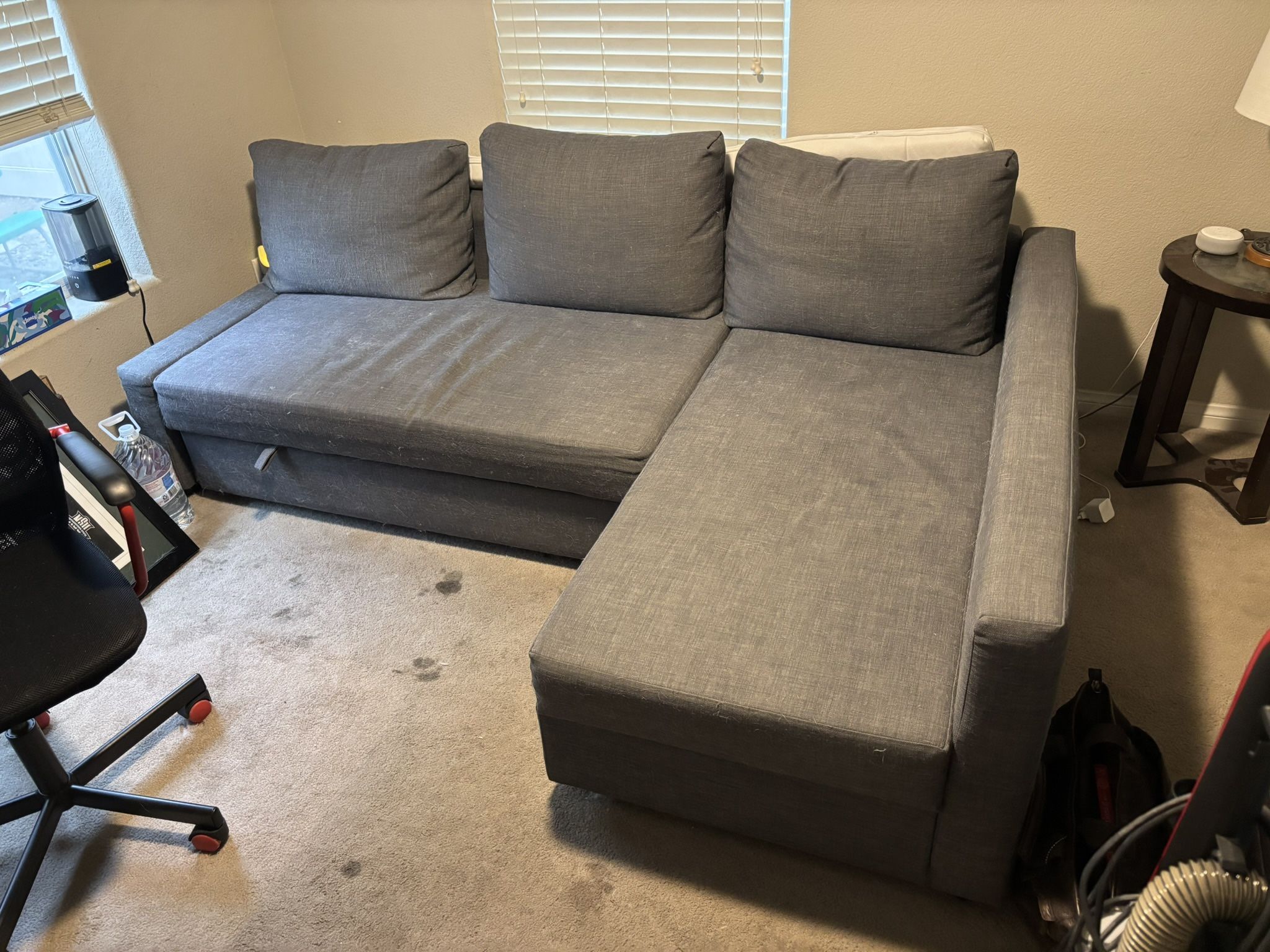 Used Sofa Couch With Storage, Bedding, And Mattress Pad