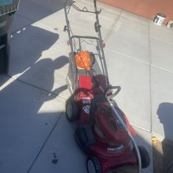 Lawnmower and weed wacker