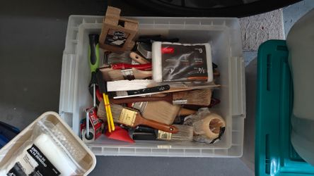 Bins of painting supplies 4 bins