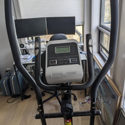 Elliptical with Inertia-Enhanced Flywheel

