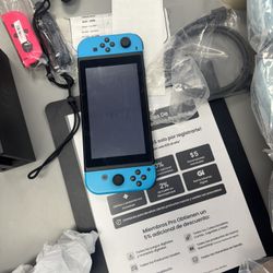 Nintendo switch barely used (Comes with free random game)