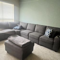 Grey Sectional  (new 3-4 Used) 