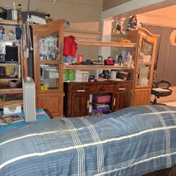 Entertainment center for a television set for a 65 inch television set to stin.Anna