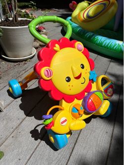 Fisher Price Musical Lion Walker