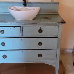 Bathroom Wooden Dresser Sink And Oval Mirror And. a glass. Tv Stand.
