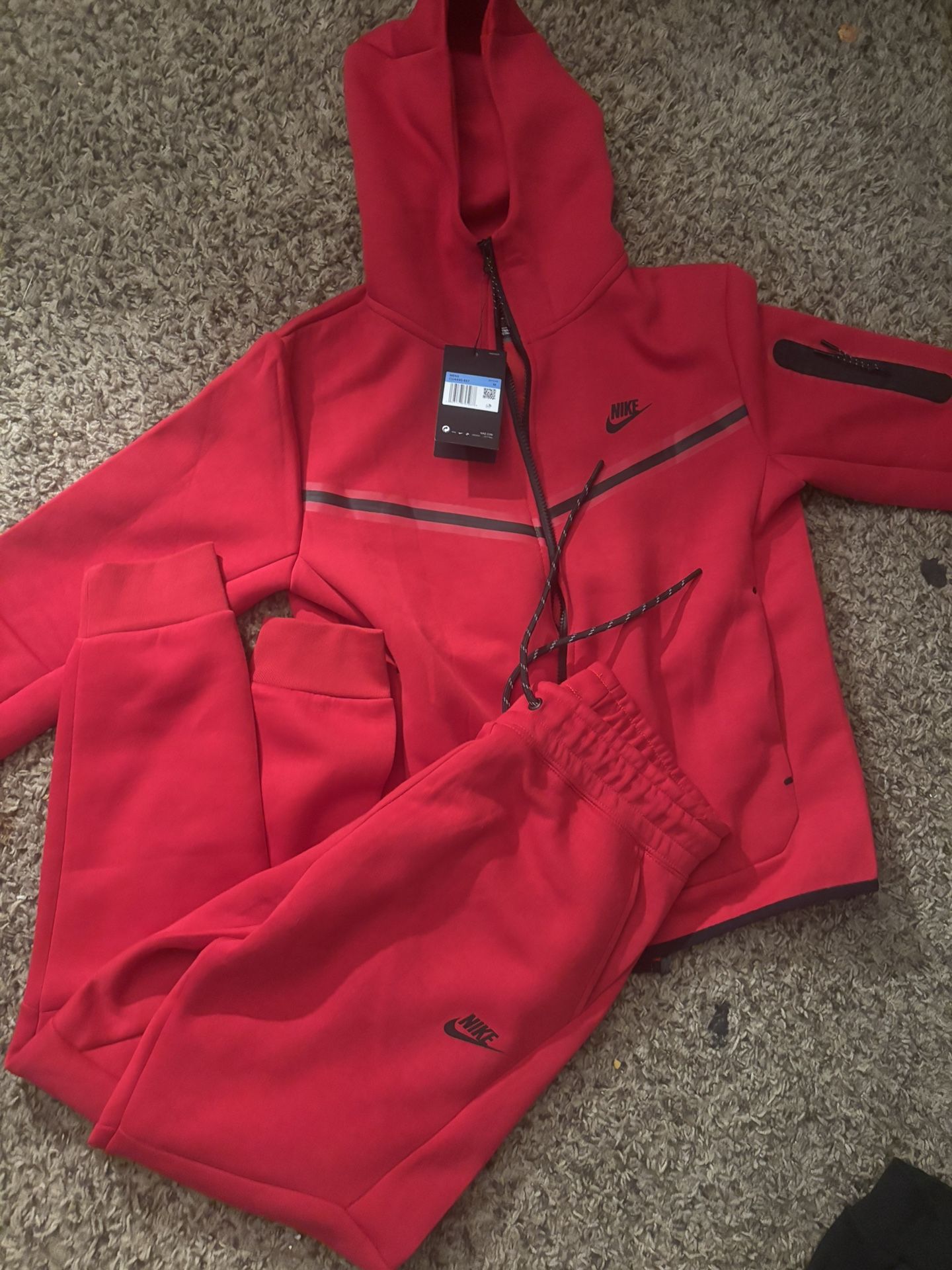 Red nike tech (small/medium)