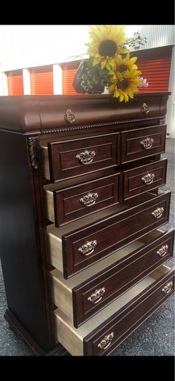 Solid wood tall chest with big drawers. Drawers sliding smoothly