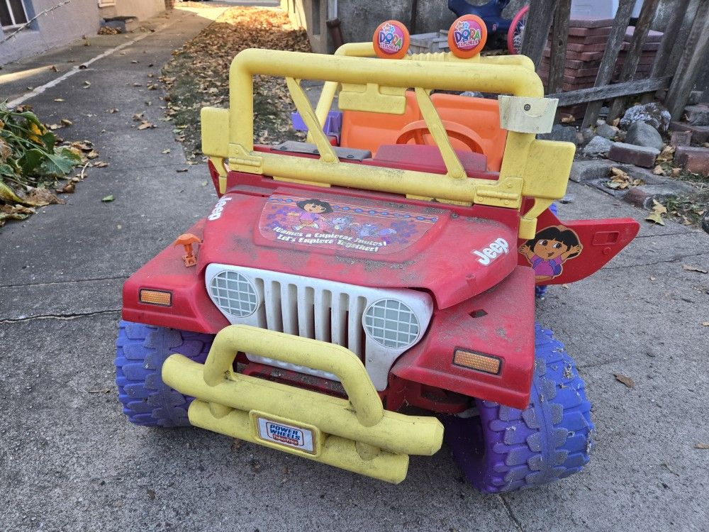 Used Power Wheel, Battery And Charger