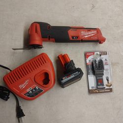 MILWAUKEE MULTI TOOL 12V LITHIUM FUEL BRUSHLESS WITH BATTERY AND CHARGER EXTRA BLADES 