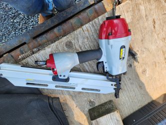 Pneumatic Nail Gun with box of framing nails