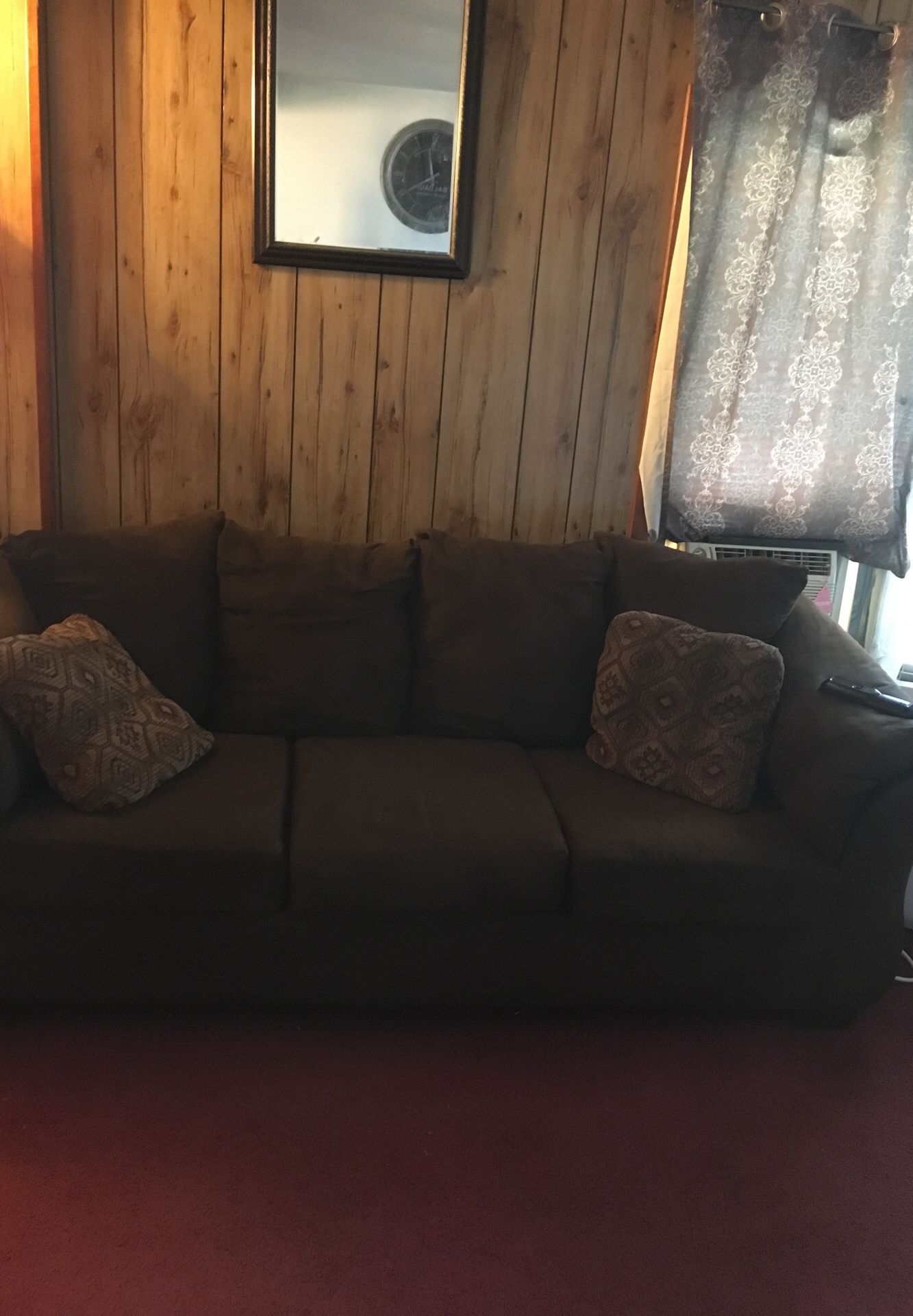 Sofa express couch and loveseat it is a brown color very well taken care of it’s about two years old no stains on it the pillows are all fluffy