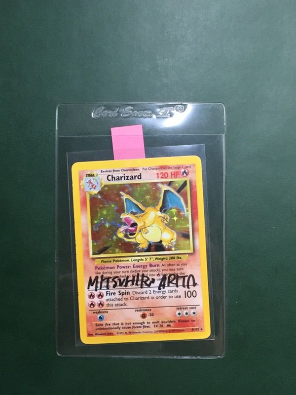 Mitsuhiro Arita signed Base Charizard Pokemon Card