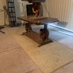 Handcarved, coffee table and footstool