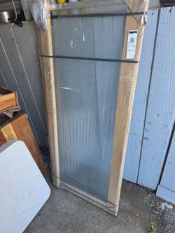 Clear glass pivot shower door 33 1/8" × 68" brand new with all hardware 

Product Details :
Dimensions: 33 1/8" x 68" [Image Context].
Glass Type: 1/8