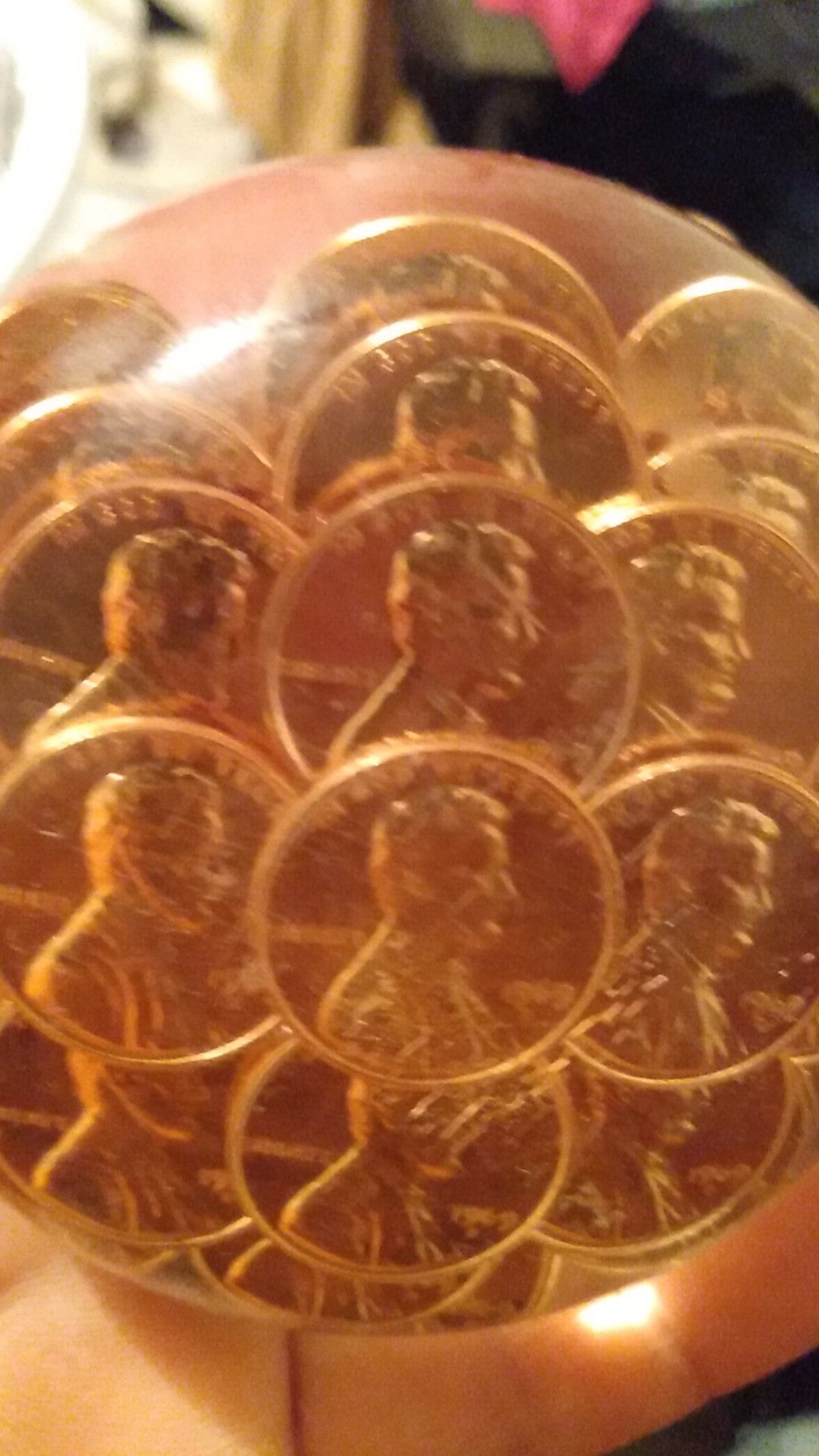 1969 pennies in epoxy paper holder