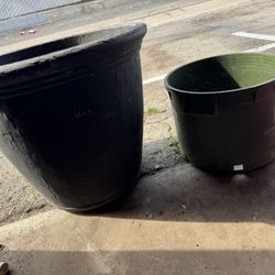 2 Plastic. Pots. One Big And One Is Small.