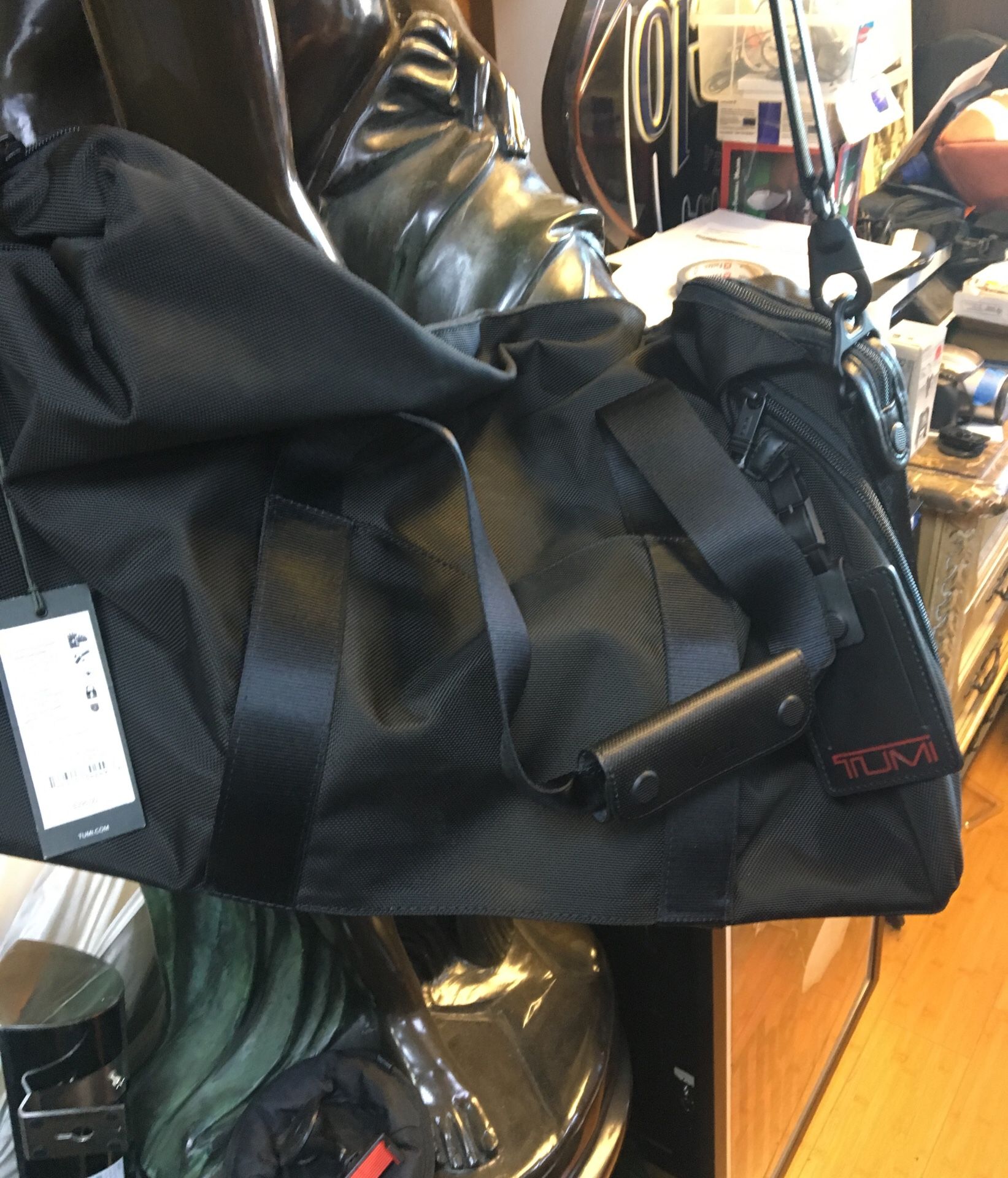 TUMI Black Duffle Bag with lock. Alpha 2 , new with tags beautiful!