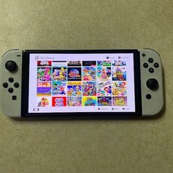 Switch Oled with 120 Switch Games and 7000 Classic Arcade Games
