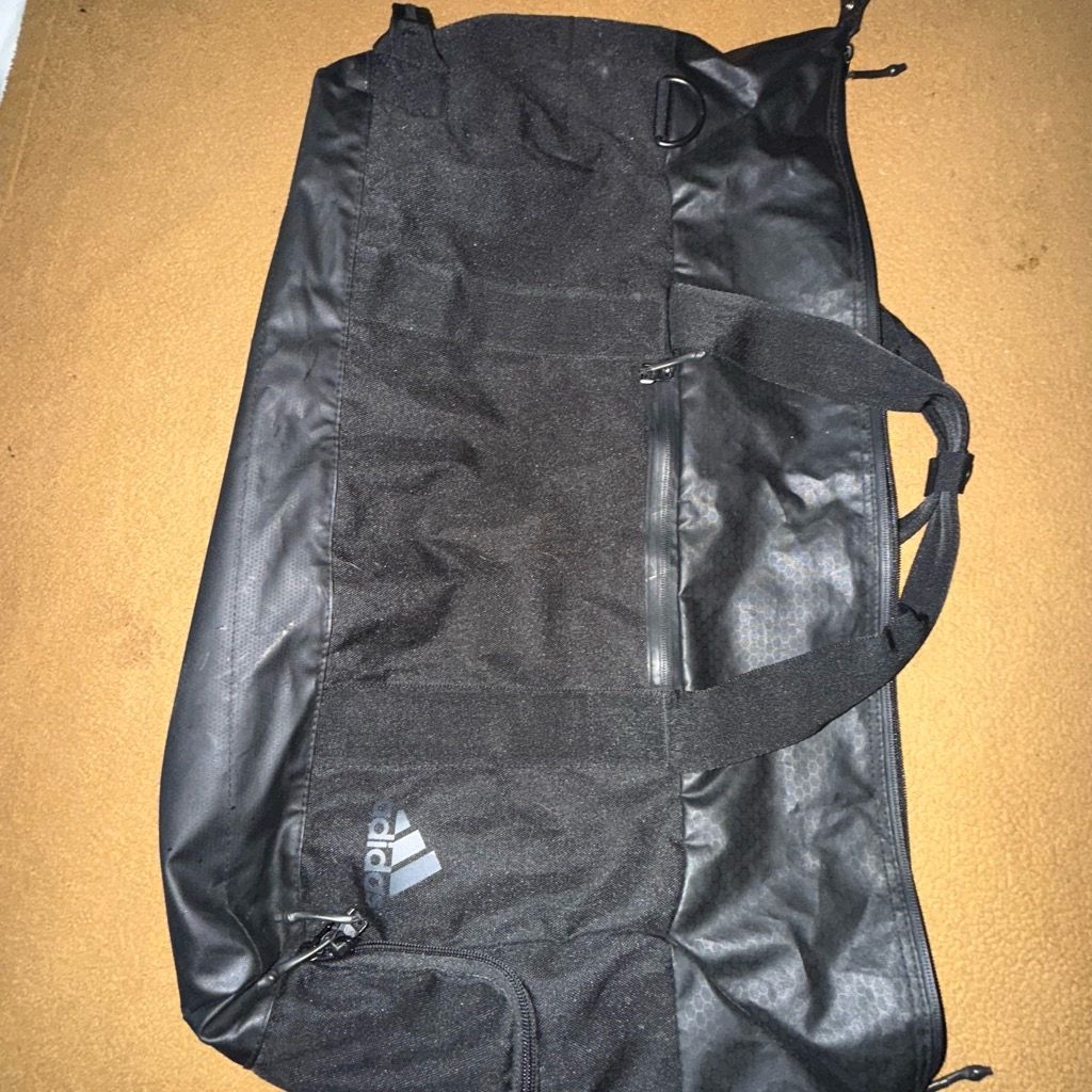 Black Adidas duffle bag with strap