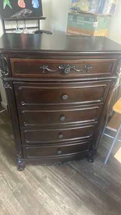 Dark brown wooden dresser