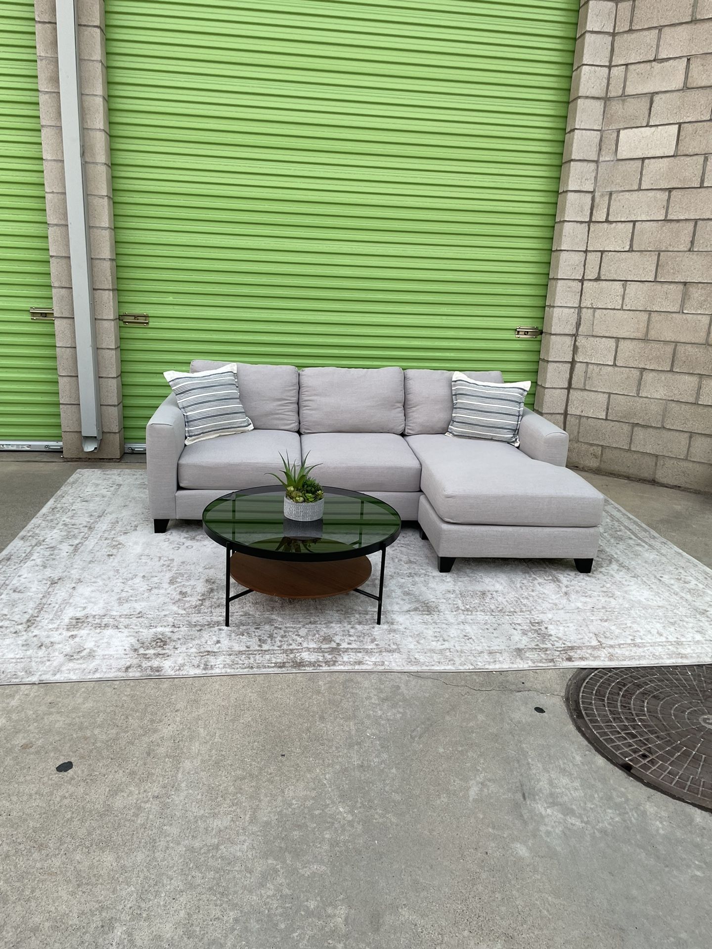 *Free Delivery* Gray Living Spaces Sectional Reversible Chaise