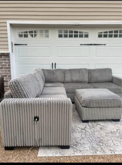 SLIGHTLY USED MODERN AND STYLISH GREY SECTIONAL CURDUROY SOFA WITH STORAGE OTTOMAN & RUG