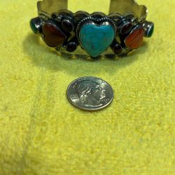 Vintage sterling silver wrist bracelet with turquoise, green, jade, purple, amethyst, and red amethyst very nice piece