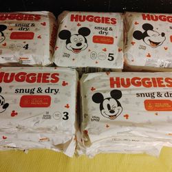 Huggies snug & Dry Diapers Size Available:  5, 4, 3 and 2